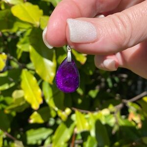 Beautiful sugilite pendant set in 925 Sterling silver bail